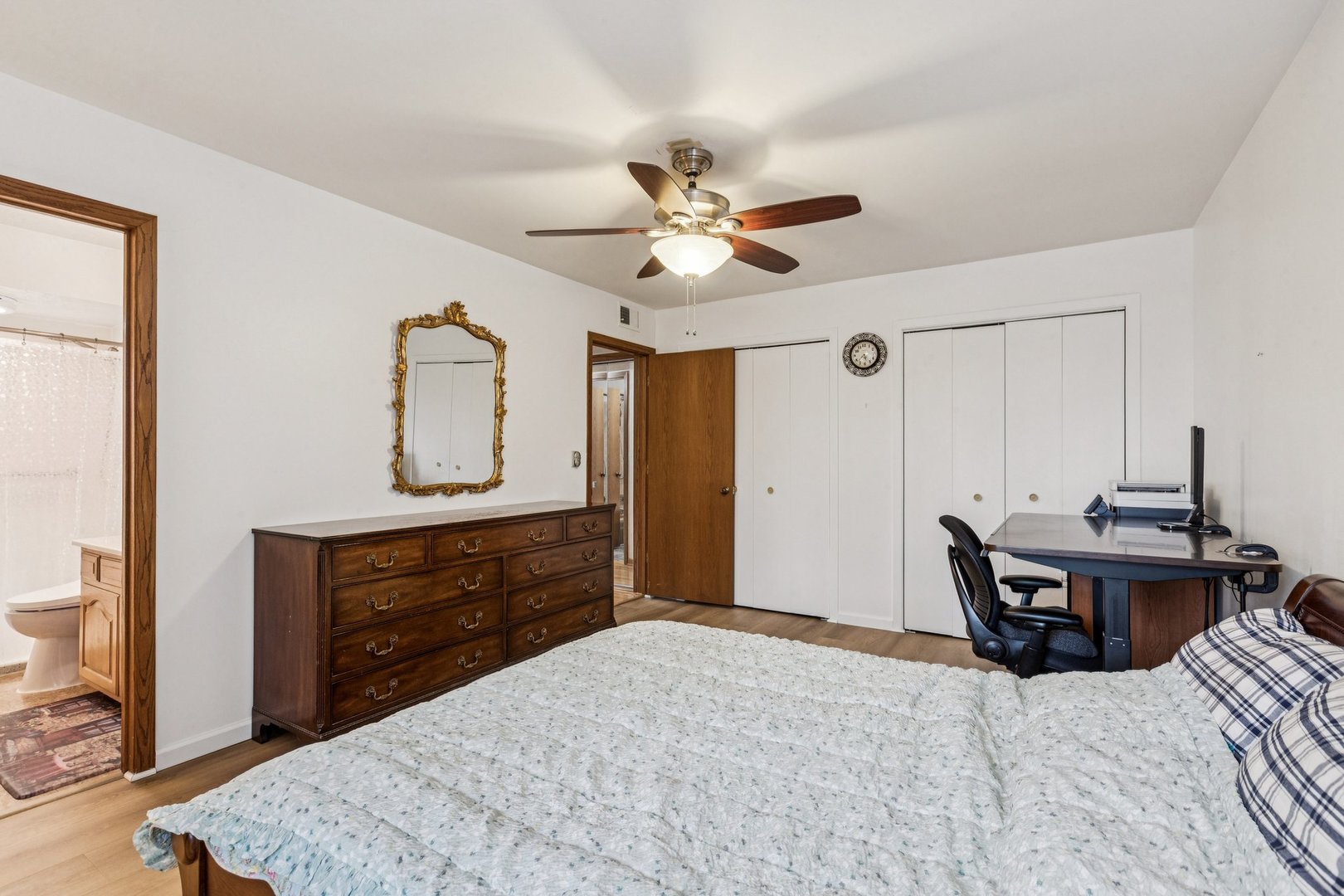 522 East Algonquin Road, Unit 201 Schaumburg, IL 60173 - Photo 22 of 27 a bed room with a bed and a dresser
