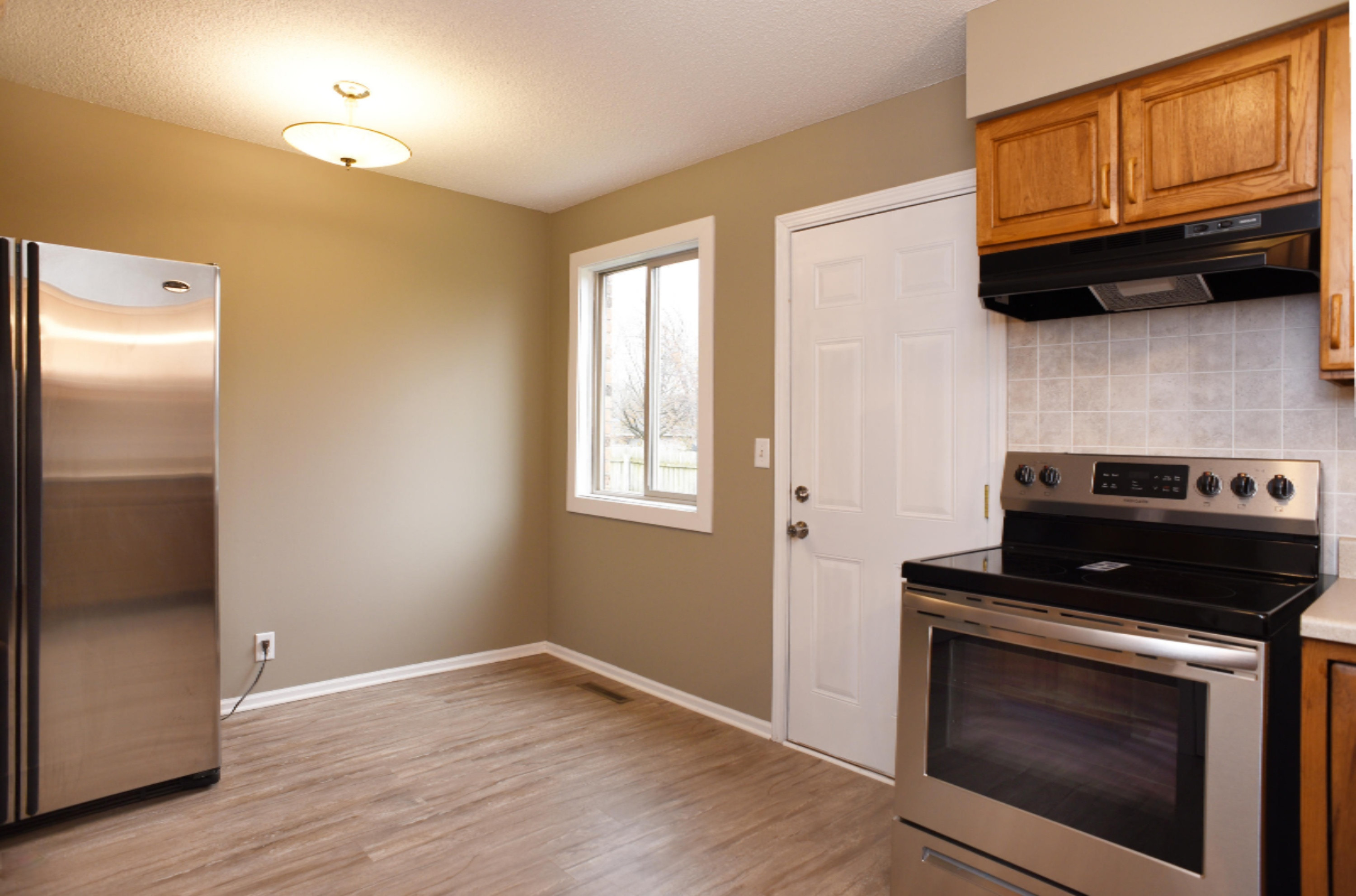 305 Riley Street, Unit 8 Holland, MI 49424 - Photo 3 of 14 _kitchen - dining area