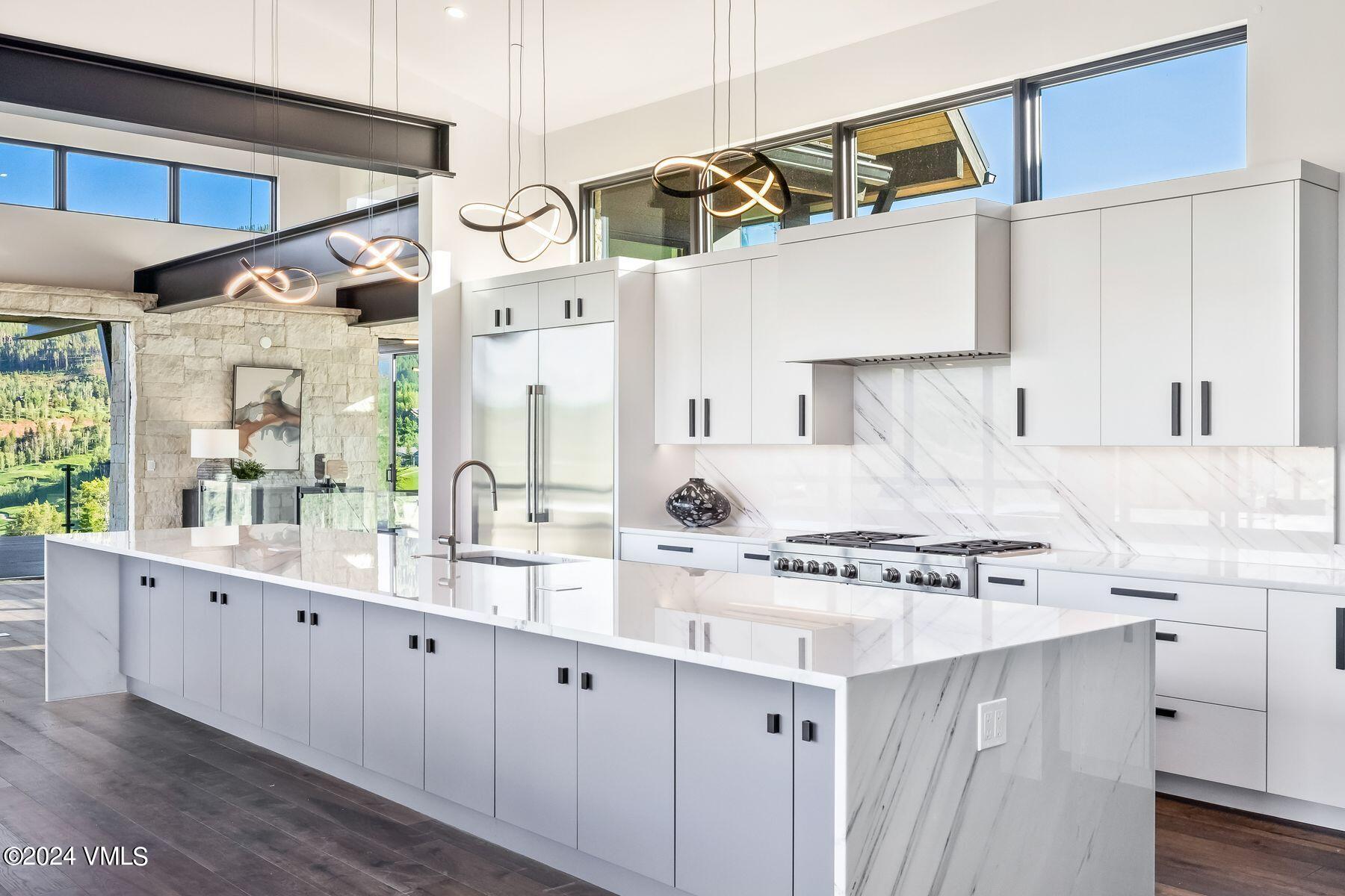 636 Saddle Ridge Loop Edwards, CO 81632 - Photo 21 of 46 a kitchen with stainless steel appliances a sink and a cabinets