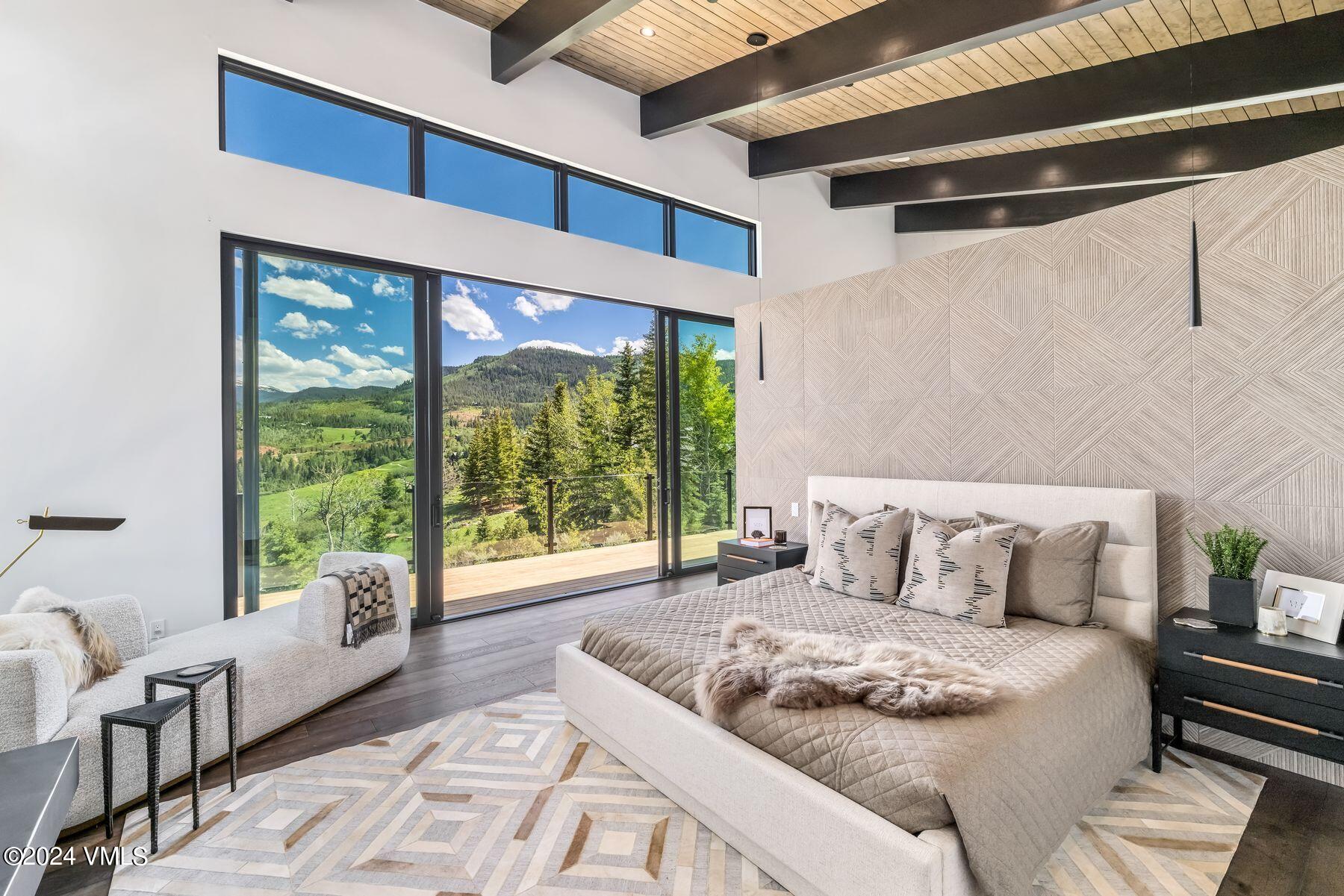 636 Saddle Ridge Loop Edwards, CO 81632 - Photo 29 of 46 a living room with furniture and a large window