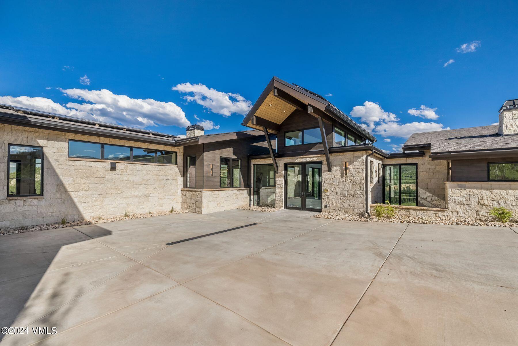 636 Saddle Ridge Loop Edwards, CO 81632 - Photo 40 of 46 a view of a house with a patio