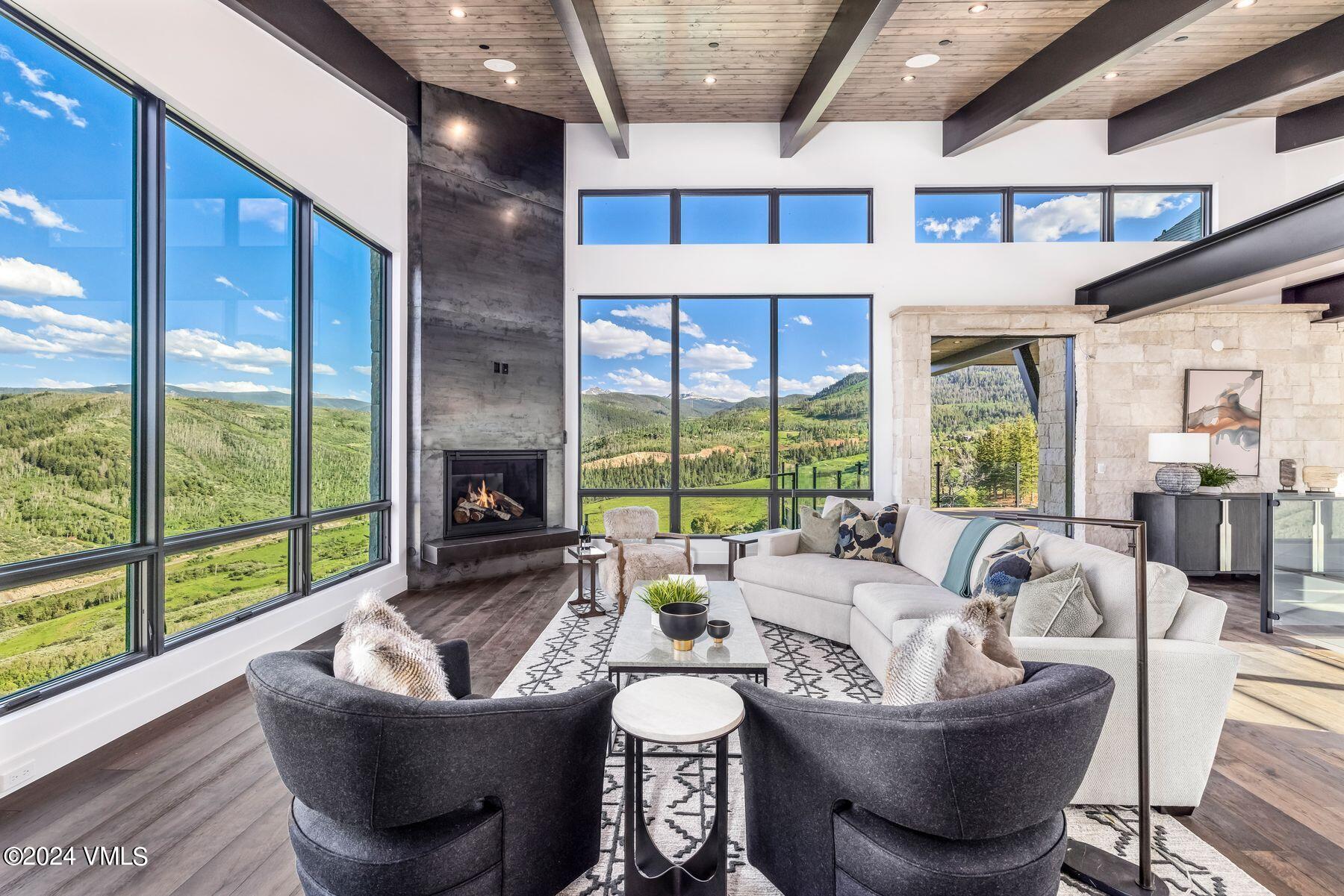 636 Saddle Ridge Loop Edwards, CO 81632 - Photo 6 of 46 a living room with furniture and a large window