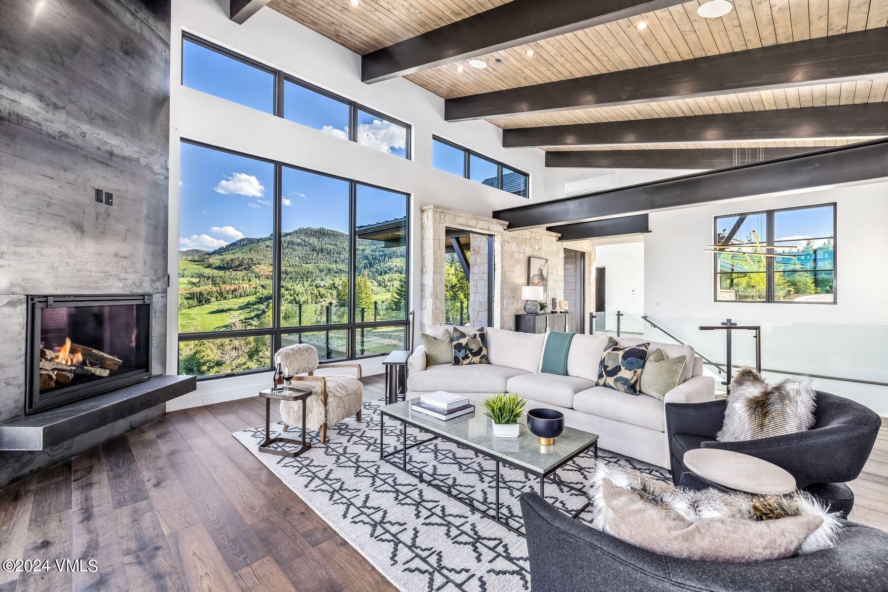636 Saddle Ridge Loop Edwards, CO 81632 - Photo 9 of 46 a living room with furniture and a fireplace
