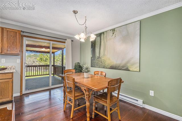 19260 Spring Valley Road Monument, CO 80132 - Photo 5 of 32 Dining Area with sliding door to Deck
