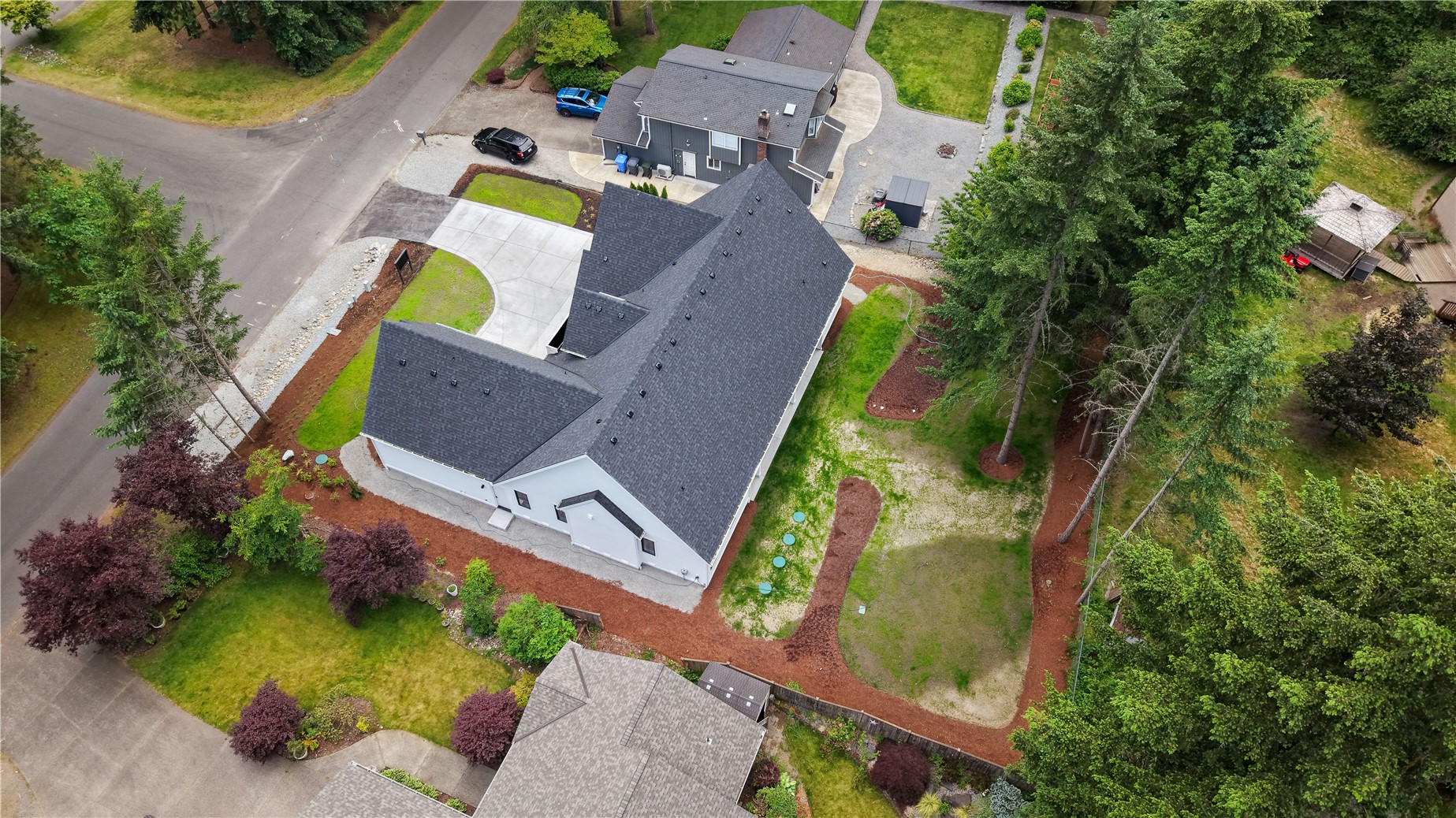 6709 254th Street East Graham, WA 98338 - Photo 39 of 40 an aerial view of a house with a swimming pool