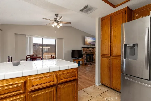 a kitchen with stainless steel appliances a refrigerator and a sink