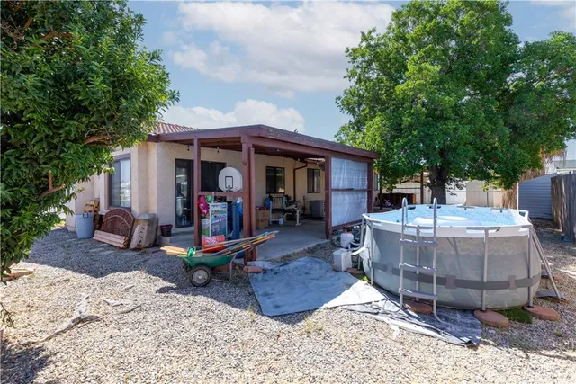 a view of a chairs and tables in the patio