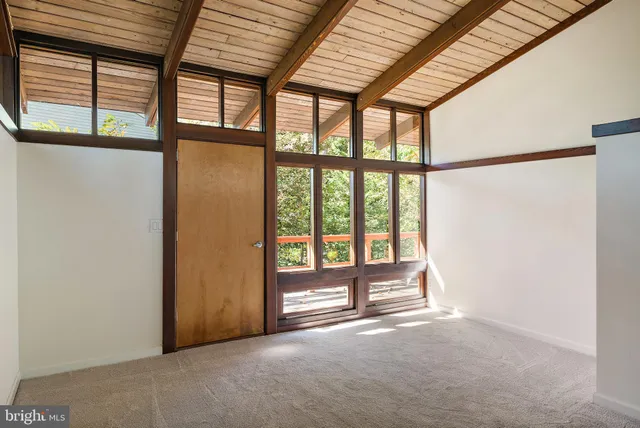 an empty room with windows