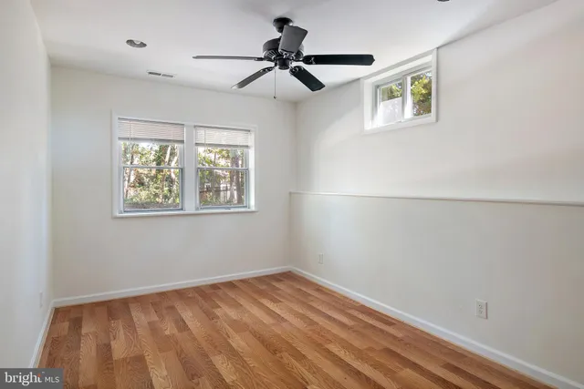 a view of a room with rack on the wall