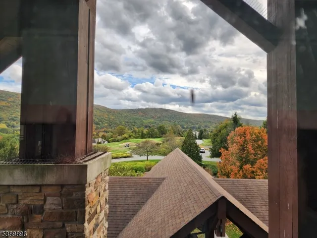 a view of a balcony with an outdoor space