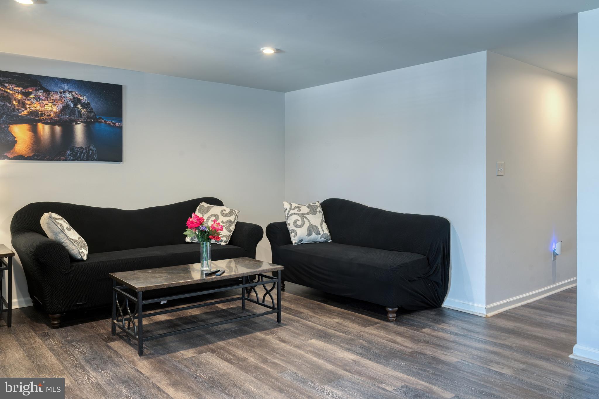 133 Spire Place Sewell, NJ 08080 - Photo 13 of 49 a living room with furniture and a wooden floor