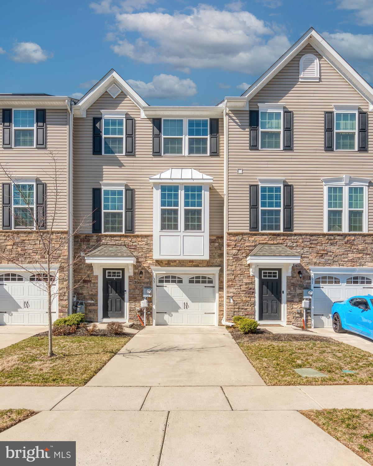133 Spire Place Sewell, NJ 08080 - Photo 2 of 49 a front view of a house with many windows