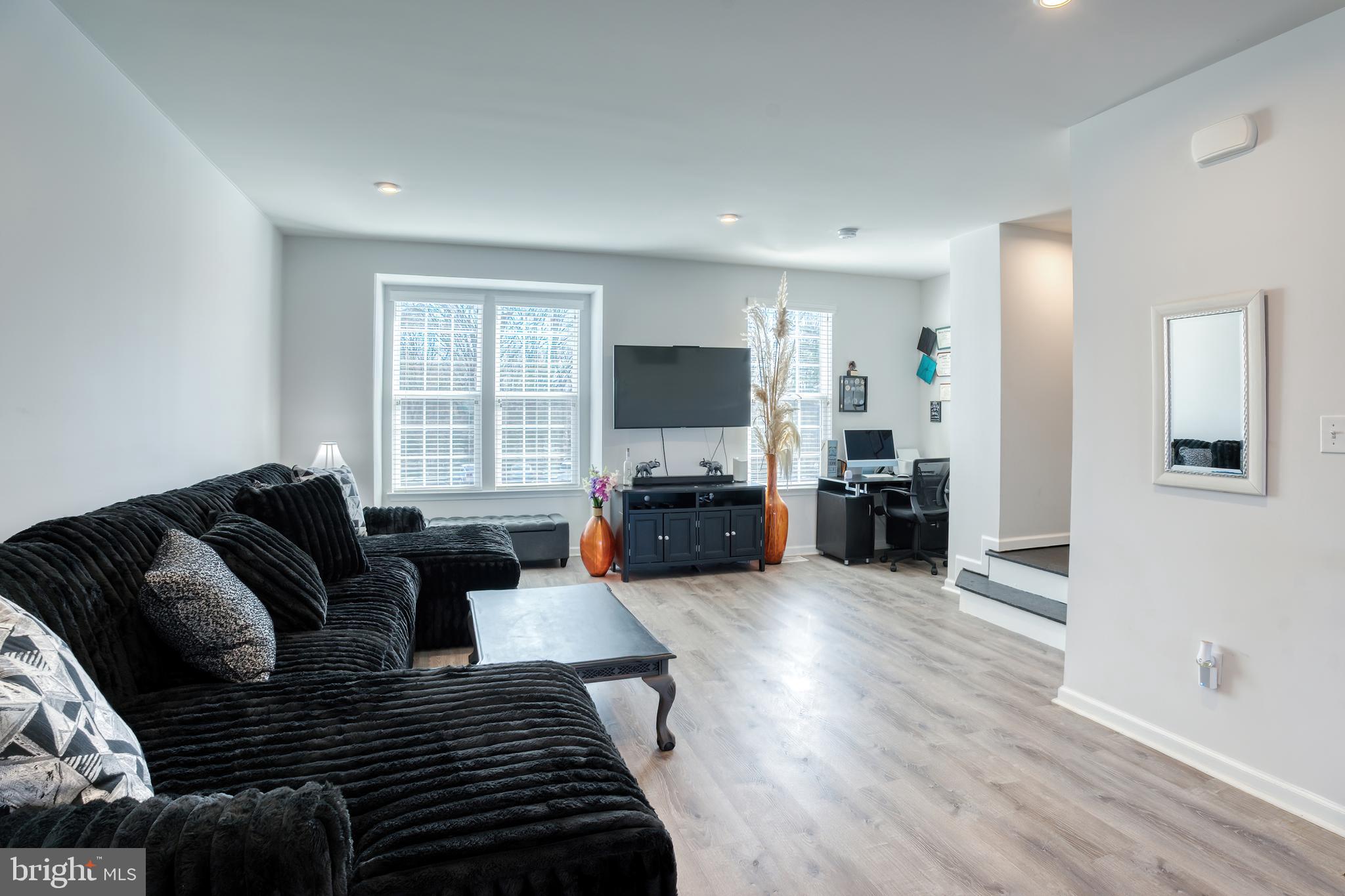 133 Spire Place Sewell, NJ 08080 - Photo 26 of 49 a living room with furniture and a flat screen tv