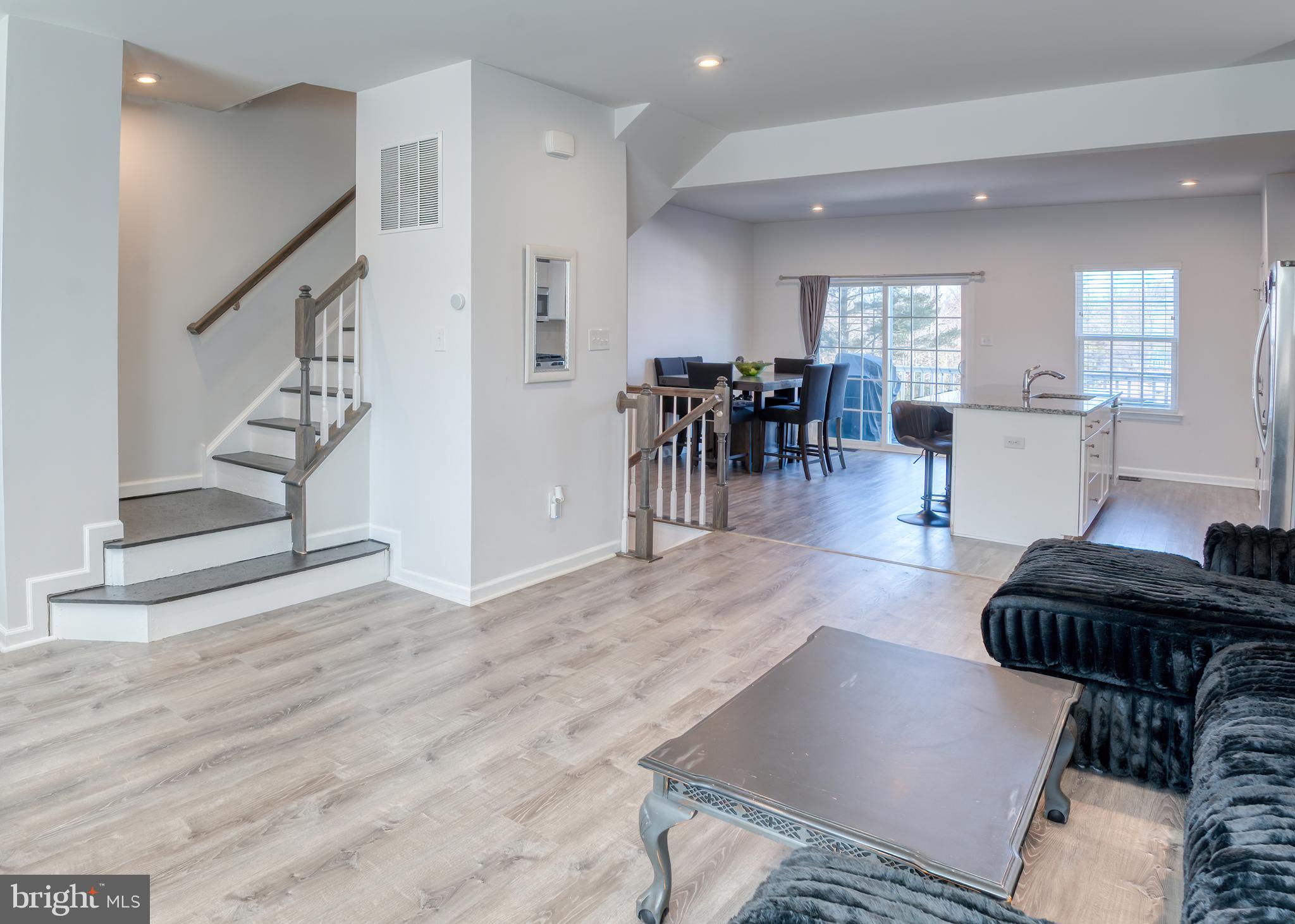 133 Spire Place Sewell, NJ 08080 - Photo 28 of 49 a living room with furniture and wooden floor