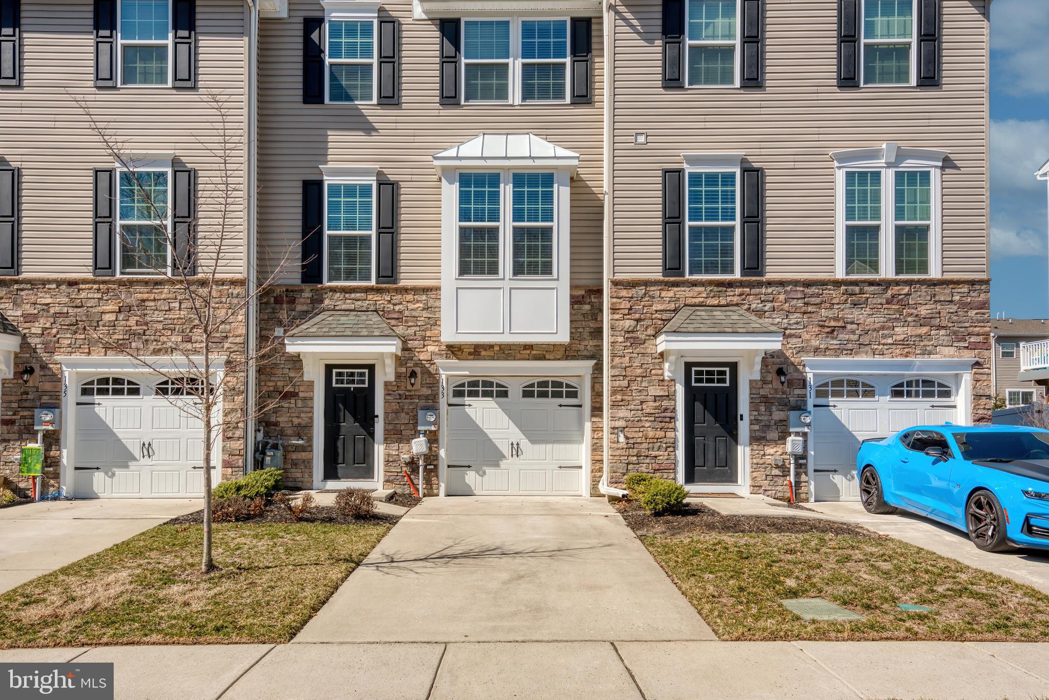 133 Spire Place Sewell, NJ 08080 - Photo 3 of 49 a front view of a house with yard