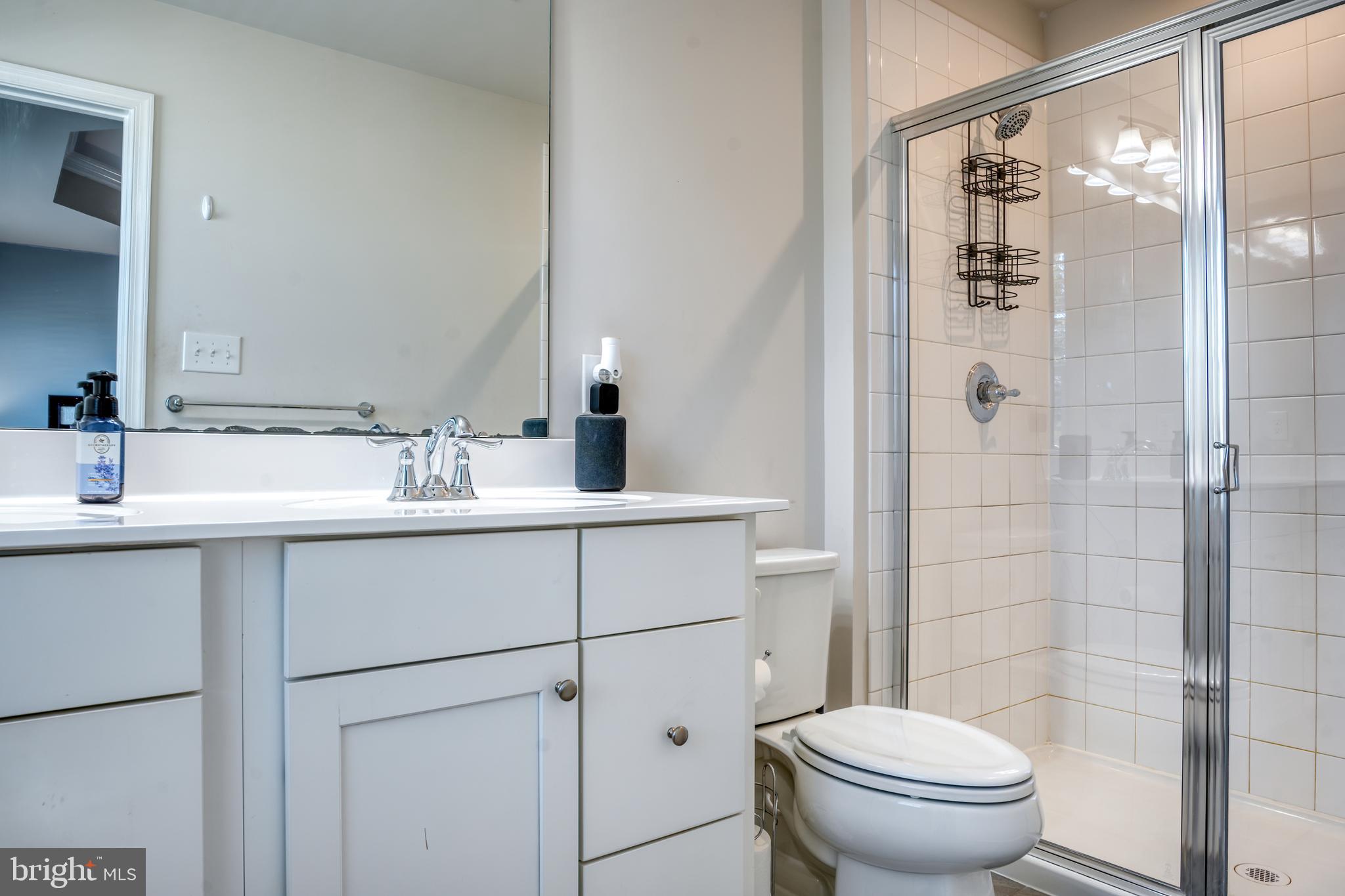 133 Spire Place Sewell, NJ 08080 - Photo 36 of 49 a bathroom with a sink toilet and shower