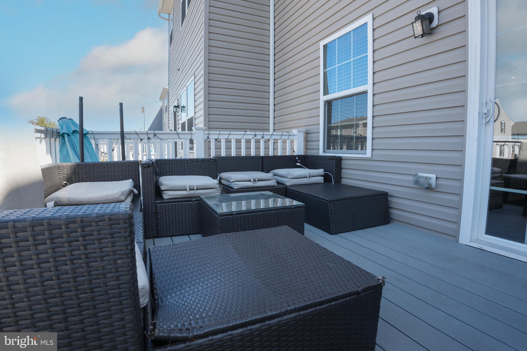133 Spire Place Sewell, NJ 08080 - Photo 45 of 49 a view of a terrace with furniture and wooden floor