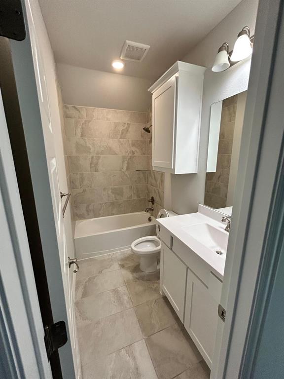 1704 Dunbrook Road McKinney, TX 75071 - Photo 14 of 17 Full bath featuring vanity and shower / bathtub combination