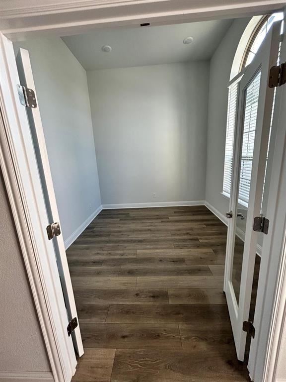 1704 Dunbrook Road McKinney, TX 75071 - Photo 17 of 17 Office room wood-type flooring and french doors