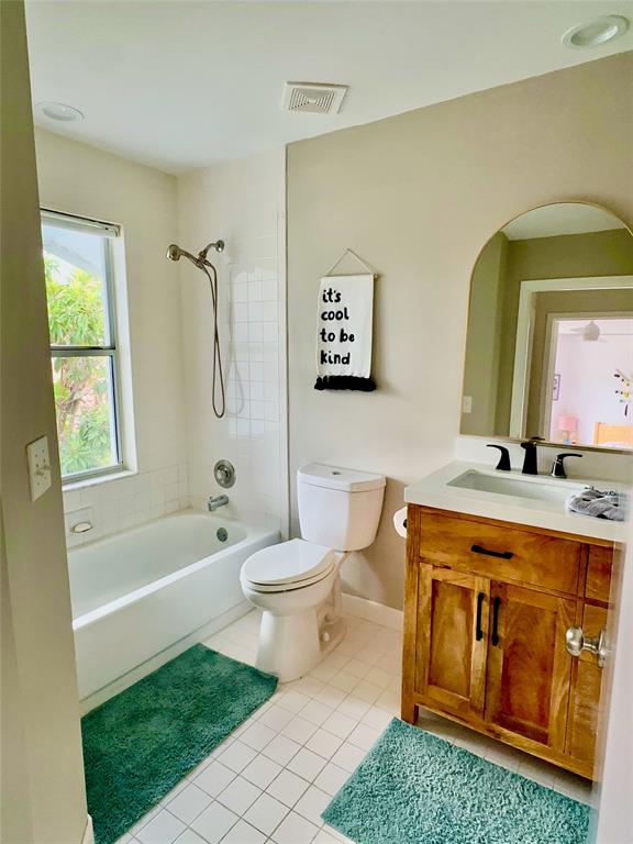 2295 Northwest 53rd Street Boca Raton, FL 33496 - Photo 17 of 89 a bathroom with a sink a toilet and a bathtub