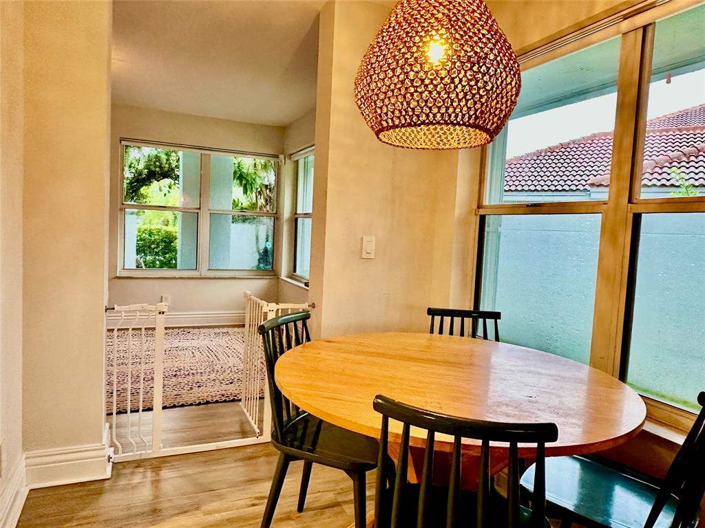 2295 Northwest 53rd Street Boca Raton, FL 33496 - Photo 26 of 89 a dining room with furniture and window