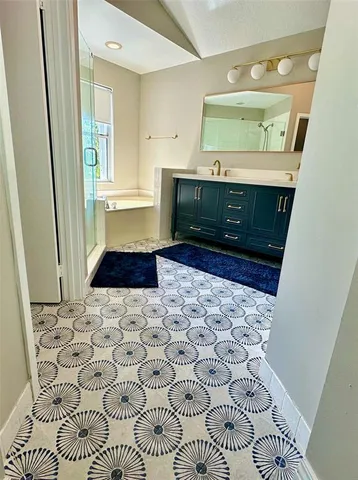 a front view of a house with a garden and swimming pool