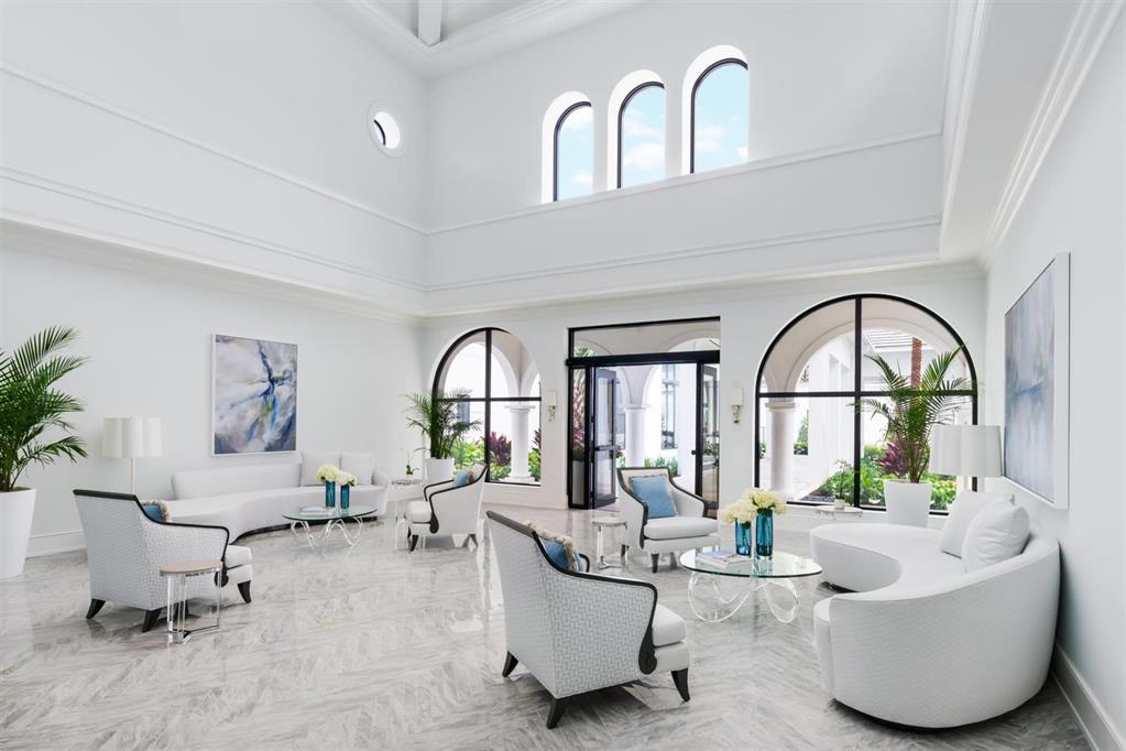 2295 Northwest 53rd Street Boca Raton, FL 33496 - Photo 51 of 89 a living room with furniture and a large window