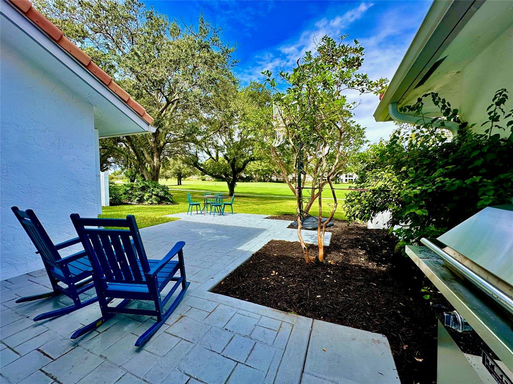 2295 Northwest 53rd Street Boca Raton, FL 33496 - Photo 8 of 89 a view of an outdoor sitting area with golf course