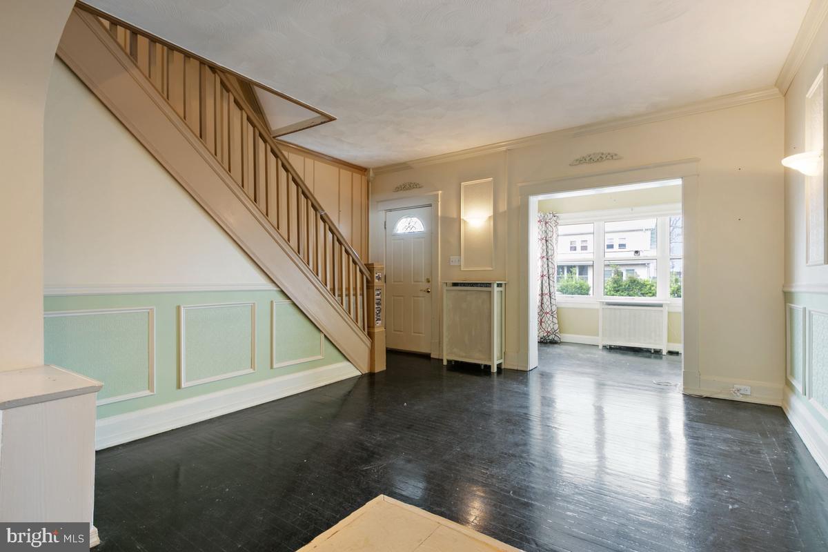 1745 Portship Road Dundalk, MD 21222 - Photo 5 of 44 a view of an entryway with wooden floor and door