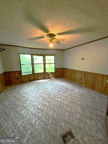 a view of a livingroom with a staircase