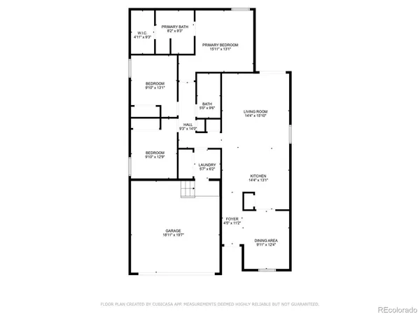 a picture of a room with a cabinet and a refrigerator