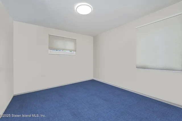 an empty room with a workbench