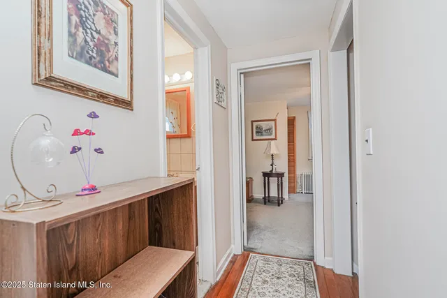 a view of kitchen with furniture and wooden floor