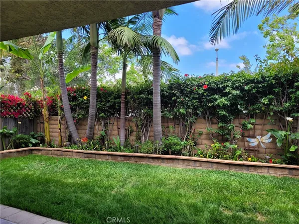a view of a swimming pool with sitting area