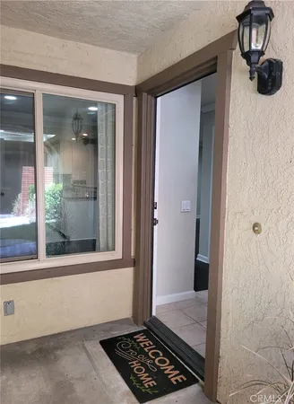 a view of a hallway with a furniture