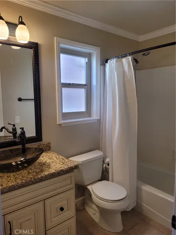 a view of livingroom with furniture and floor to ceiling window