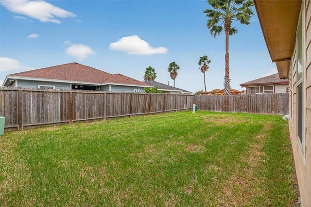a view of a backyard with a garden