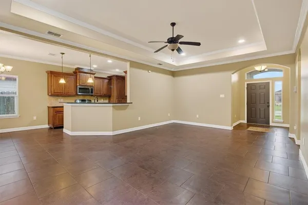 a view of a kitchen with a sink and a window