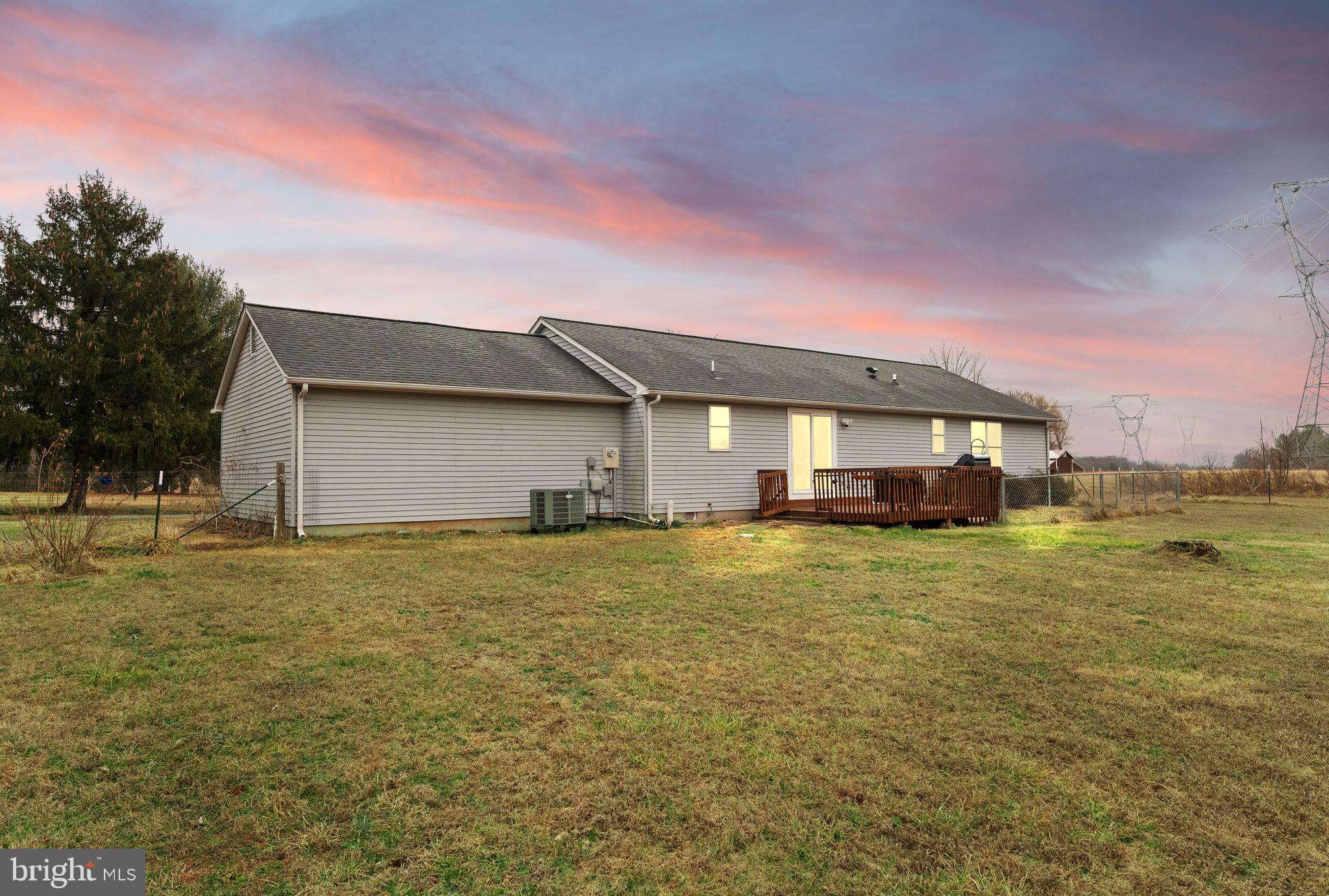 14068 Carriage Ford Road Nokesville, VA 20181 - Photo 3 of 48 a front view of house with yard and lake view