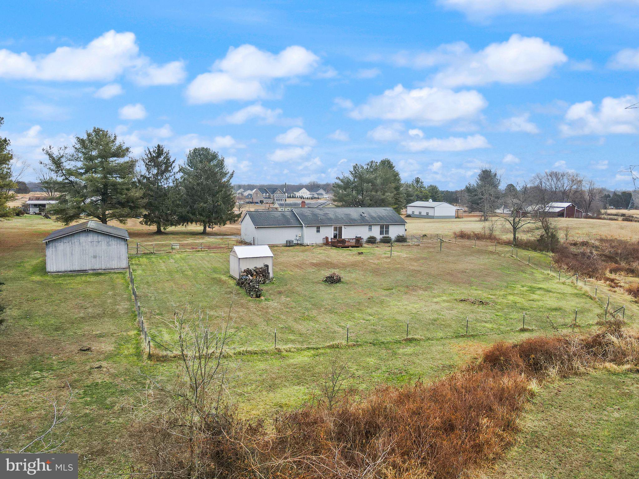 14068 Carriage Ford Road Nokesville, VA 20181 - Photo 39 of 48 a swimming pool with trees in the background