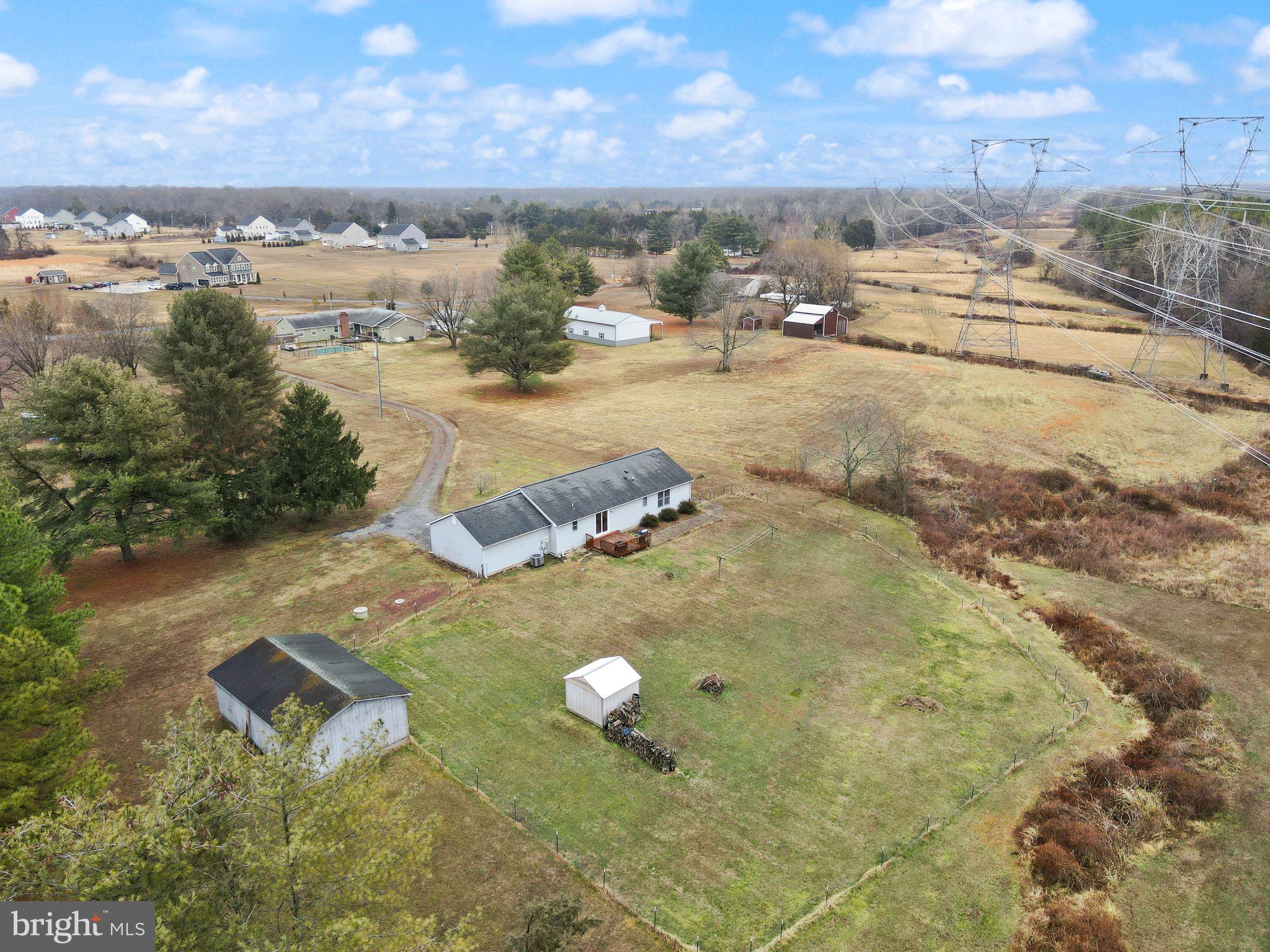 14068 Carriage Ford Road Nokesville, VA 20181 - Photo 47 of 48 an aerial view of residential houses with outdoor space