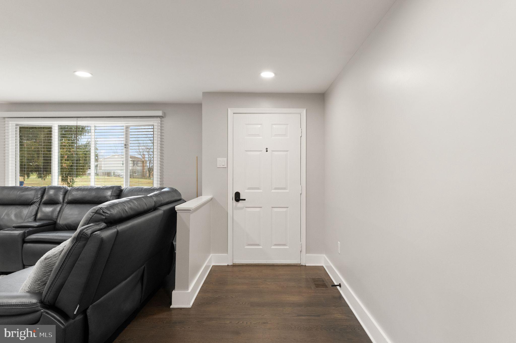 14068 Carriage Ford Road Nokesville, VA 20181 - Photo 10 of 48 a living room with furniture and a air conditioner vent