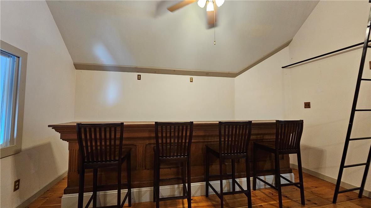 585 Buttermilk Road Hellertown, PA 18055 - Photo 77 of 82 Craft a lively gathering space with a classic wooden bar, perfect for entertaining.