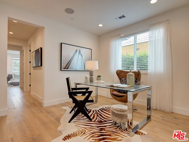 a workspace with wooden floor and a workspace