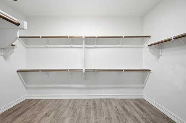 a view of an empty walk in closet