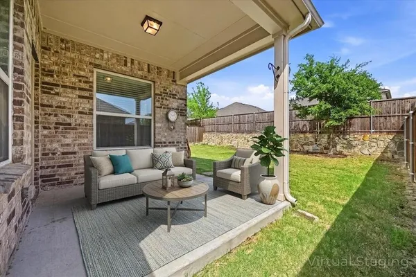 an aerial view of a house with outdoor space pool patio and outdoor seating