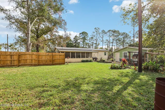 a patio with table and chairs