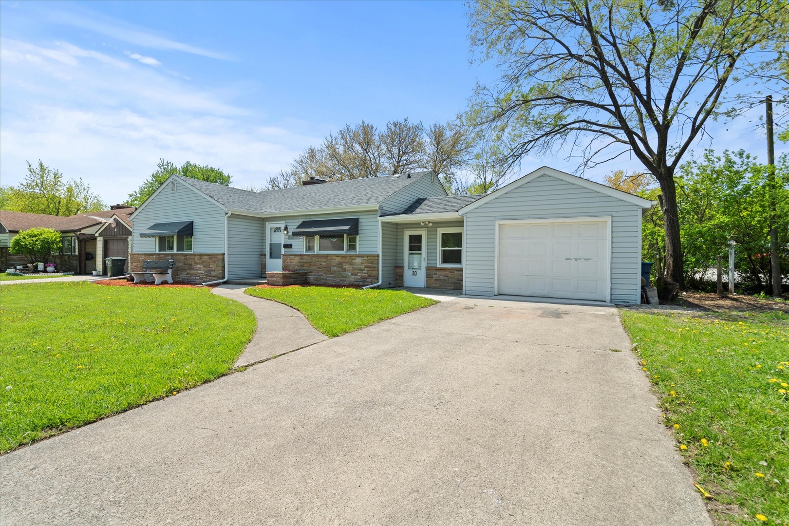 30 Broadway Chicago Heights, IL 60411 - Photo 2 of 25 a view of house with a garden and tall tress