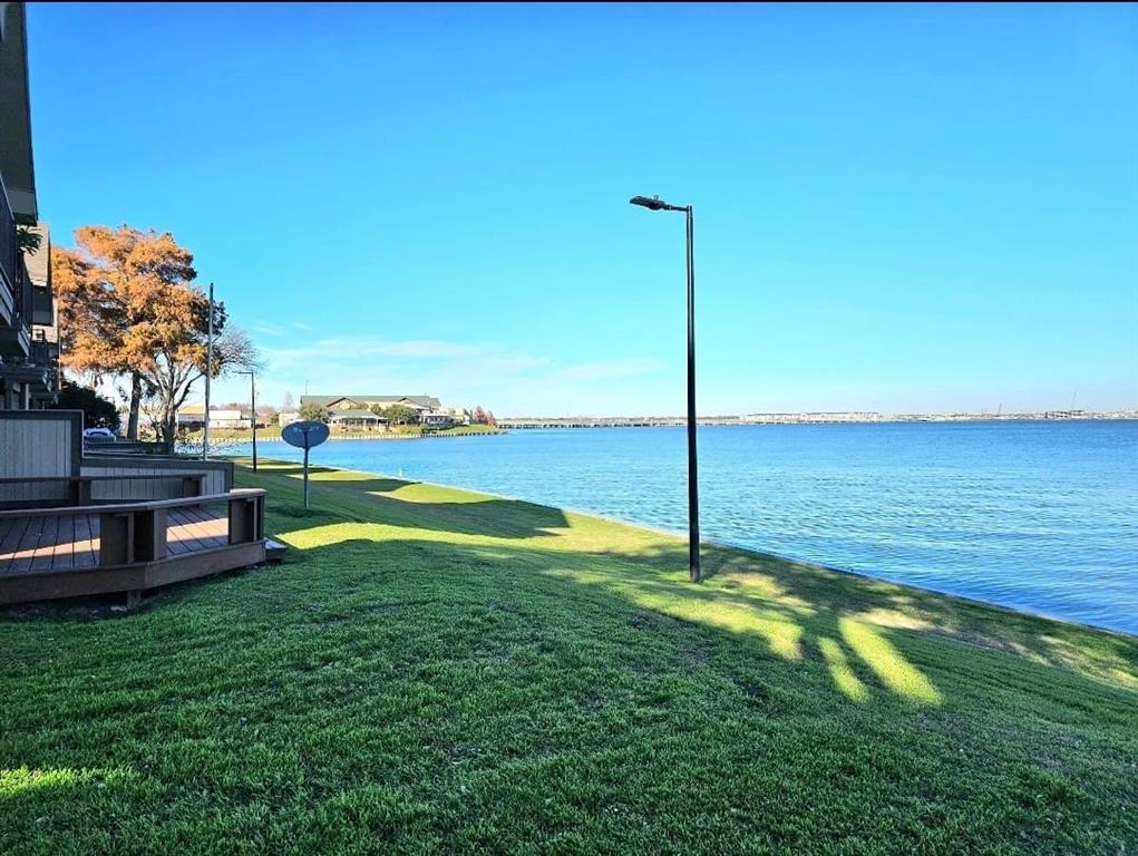 4460 Chaha Road, Unit 201 Garland, TX 75043 - Photo 16 of 16 a view of a swimming pool with a yard
