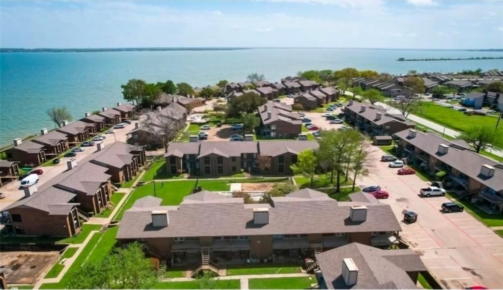 4460 Chaha Road, Unit 201 Garland, TX 75043 - Photo 2 of 16 an aerial view of a house with a garden